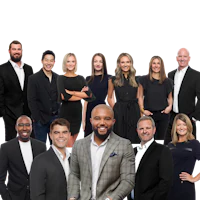 a group of business people posing for a photo